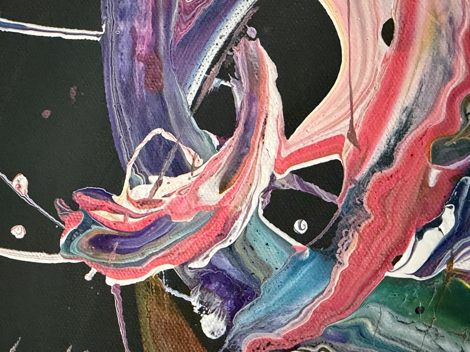 Close-up of the near-black ground on Mixed Emotions