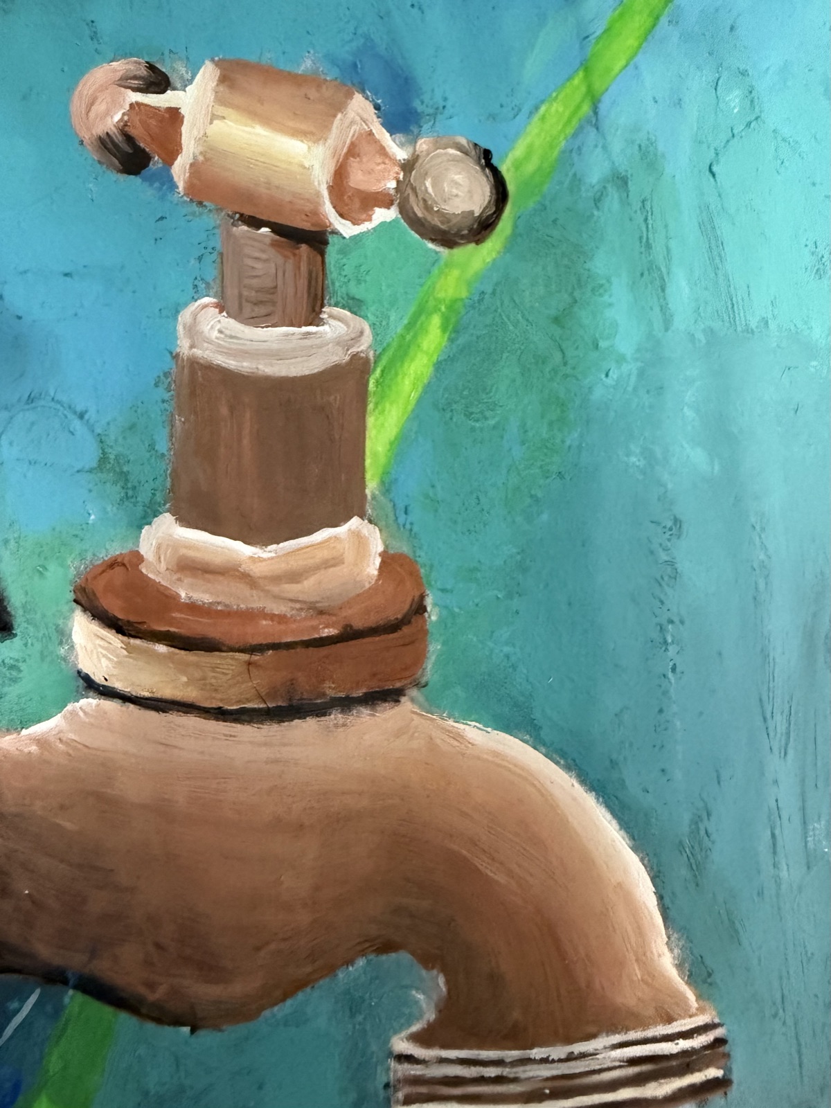 Close-up of the rusty tap and the spider's web strung beneath it